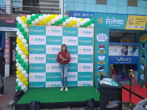 Celekt branded photo booth with a balloon arch at a store event